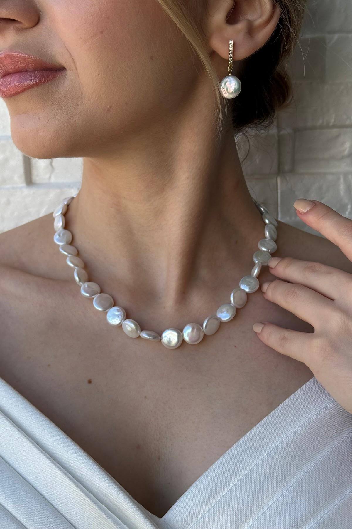 Para İnci Küpe | | Birinci1926