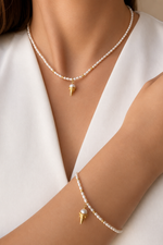 Creamy Doğal İnci Set featuring a delicate necklace and bracelet with unique designs and natural pearls.