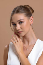 Doğal İncili 0,12 Karat Pırlantalı Küpe | | Birinci1926