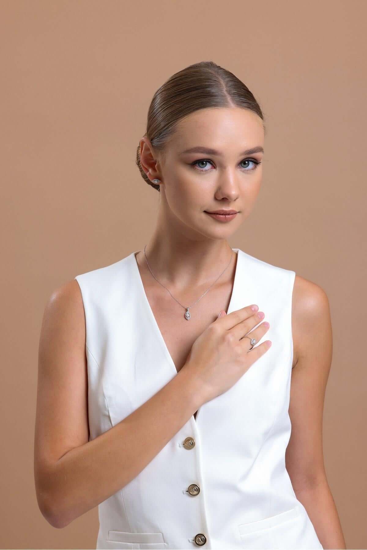 Göz Modelli 0,30 Karat Doğal İncili Pırlanta Küpe | | Birinci1926