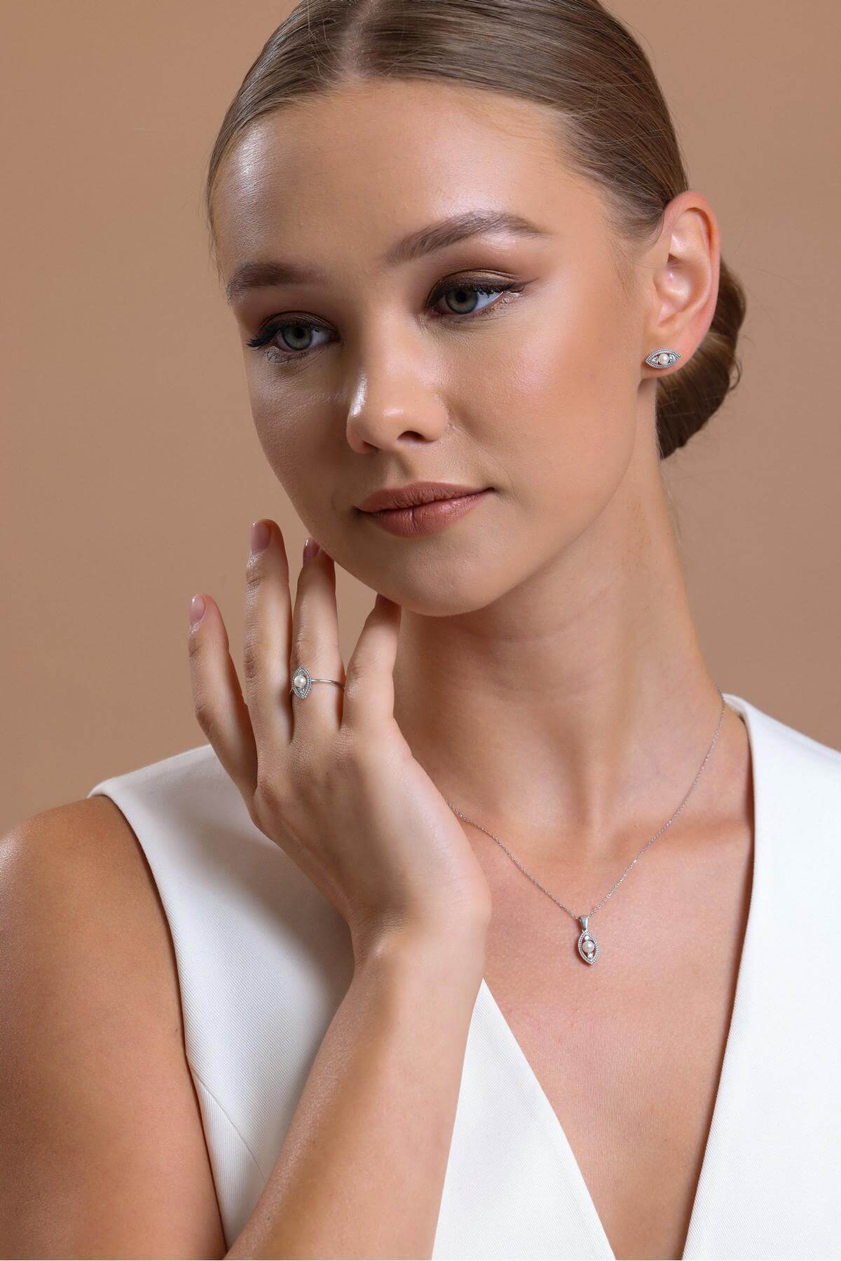 Göz Modelli 0,30 Karat Doğal İncili Pırlanta Küpe | | Birinci1926