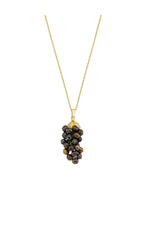 Natural pearl grape cluster necklace with gold chain and distinctive bead details.